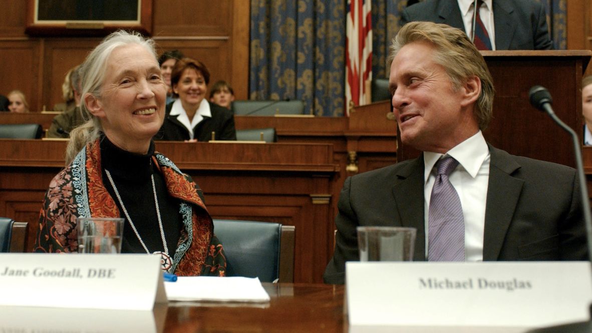 Goodall and actor Michael Douglas speak in Washington, DC, as they attend a bipartisan task force hearing on nonproliferation in 2003.