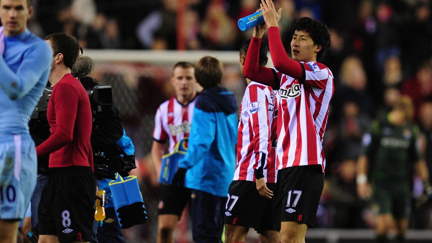 South Korean striker Ji Dong-Won (right) celebrates after Sunderland's dramatic 1-0 home win over Manchester City.
