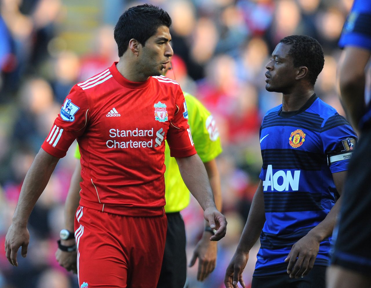 Liverpool striker Luis Suarez was handed an eight-match ban by the English Football Association for racially abusing Manchester United's Patrice Evra in a match in October 2011. Suarez refused to shake Evra's hand during the customary pre-match ritual ahead of the teams' clash on February 12 this year. The Uruguayan has since apologized for his snub of the France defender.