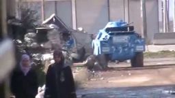 Syrian police tank sits in a neighborhood in Talbise, just north of Homs on January 3, 2012.
