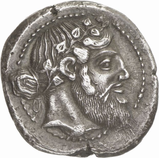 The collection includes coins, such as this silver Tetradrachm, featuring the head of Dionysos, which are of artistic significance.