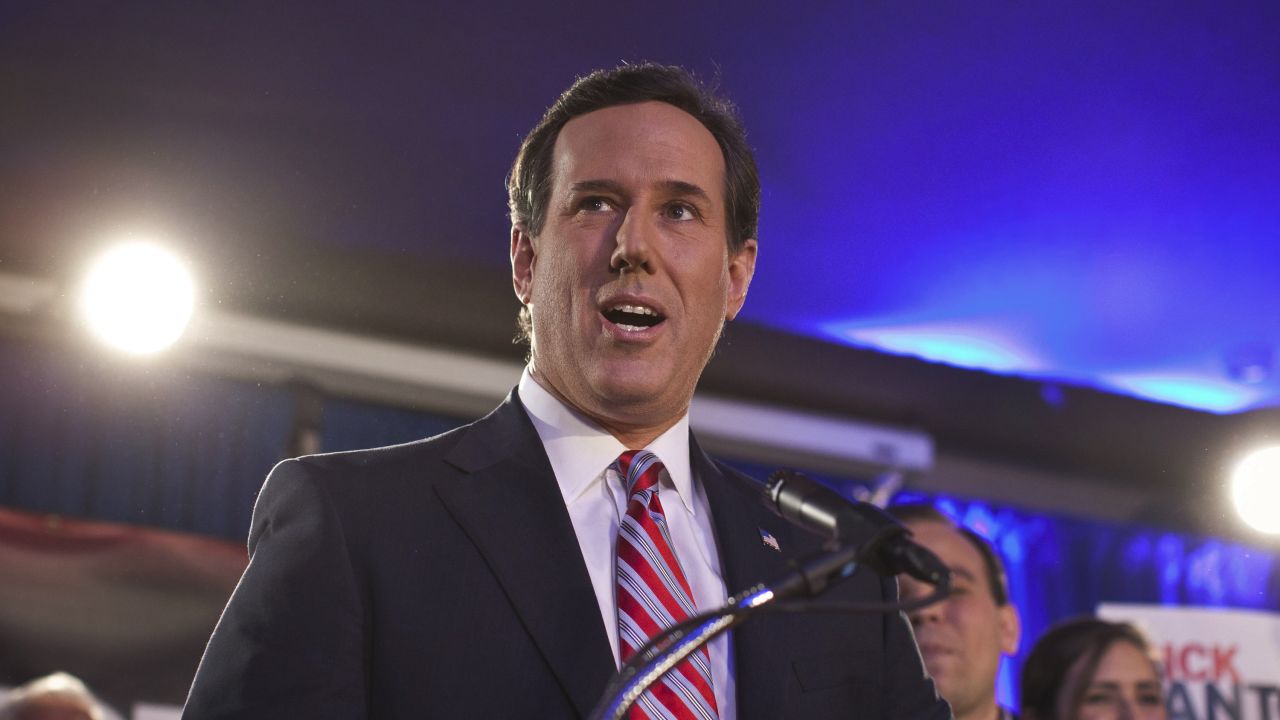 GOP presidential hopeful Rick Santorum addresses a crowd of supporters Tuesday night in Johnston, Iowa.