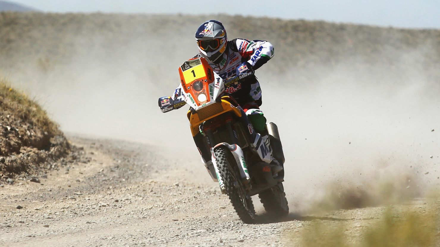 Defending champion Marc Coma won the fourth stage of the Dakar Rally but he trails leader Cyril Despres by over eight minutes.