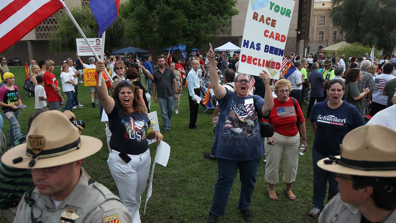  Supporters of Arizona's tough new  immigration law rally in  Phoenix when the law was proposed in 2010.