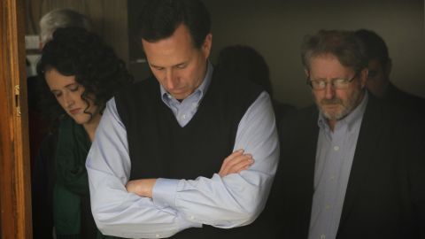  Rick Santorum bows his head in prayer during a campaign rally in Iowa this week.