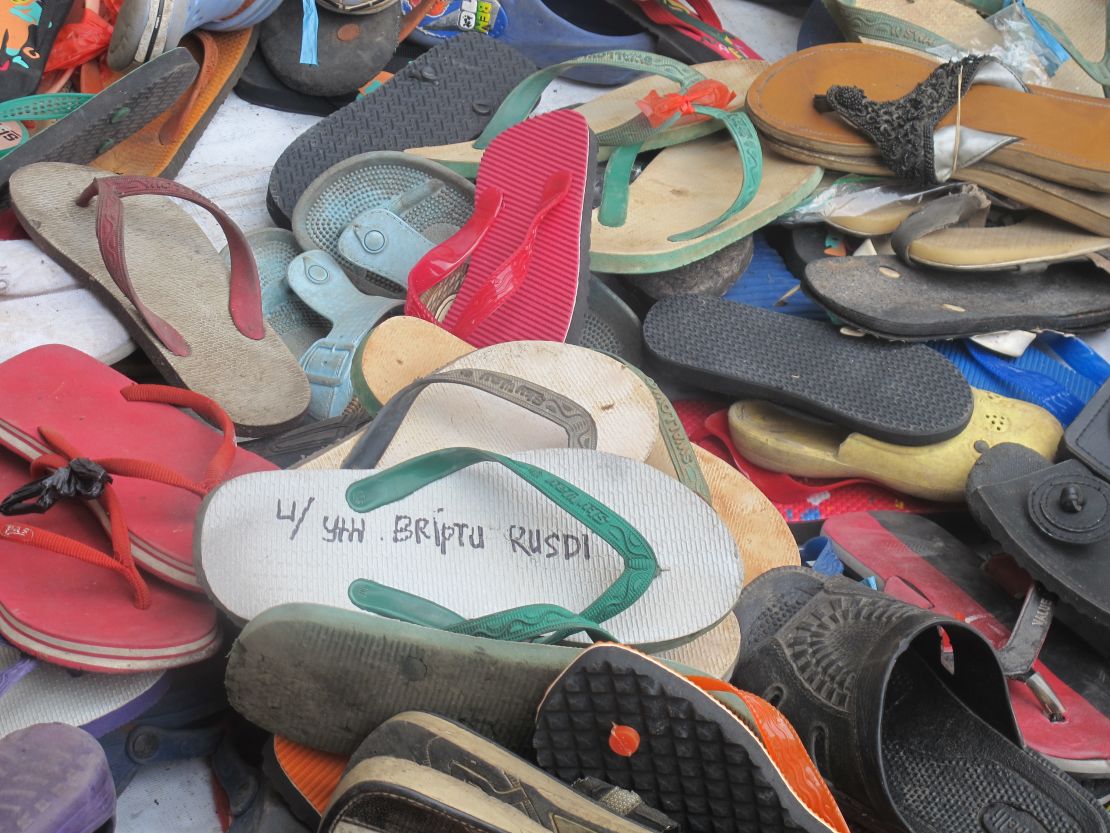 A donated flip-flop bears the name of 1st Brig. Ahmad Rusdi, the policeman who accused a boy of stealing them.