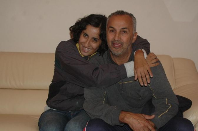 Former Algerian international Mohammed Qassi Al Saeed, pictured with his daughter Madina, is one of the players who claim they were given performance-enhancing steroids without their consent during the 1980s. 