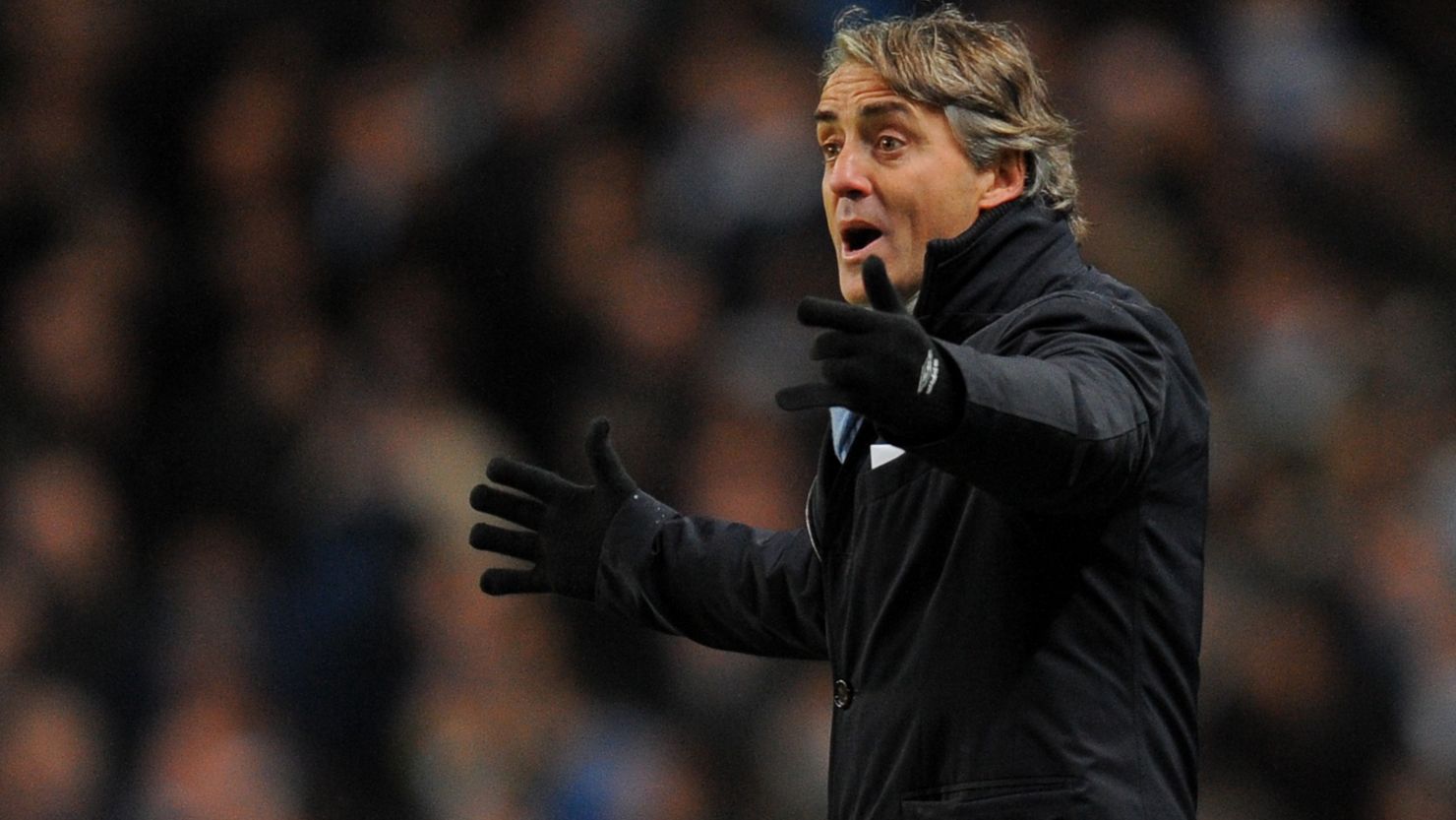 Manager Roberto Mancini has guided Manchester City to the top of the English Premier League. 