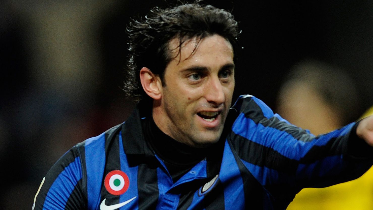 Diego Milito celebrates after scoring Inter Milan's first goal in the home romp against Parma at Stadio Giuseppe Meazza.