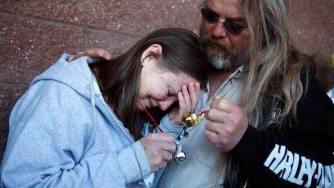 Mourners attend a memorial service in Tucson, Arizona, on January 8, 20112, one year after a shooting left six dead. 