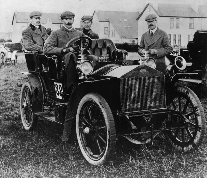 Charles Stewart Rolls, who co-founded the company with Henry Royce in 1904, sits in the back seat of a 20-horsepower Rolls Royce, during the 1905 TT (Tourist Trophy) race. 