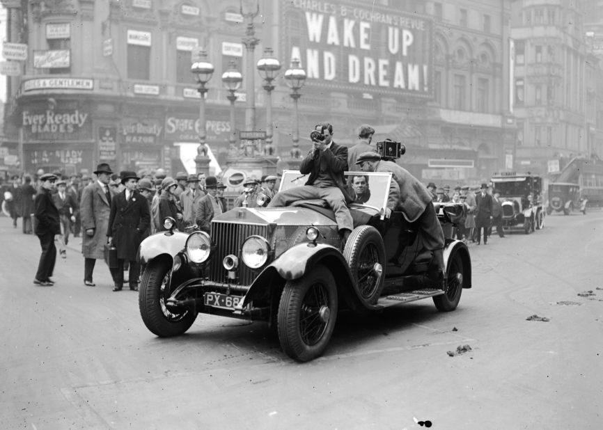 Rolls-Royce cars were valued for their reliability despite their high price. Here cameramen film from a Rolls-Royce in Piccadilly, London, in April 1929.