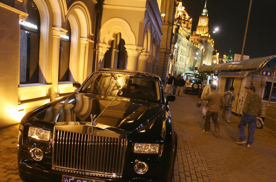 China is now one of Rolls-Royce's biggest markets. Here a Phantom is parked outside a luxury goods store on Shanghai's Bund in 2006.