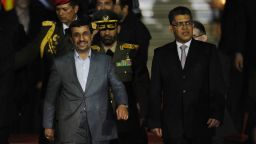 Iranian President Mahmoud Ahmadinejad (L) is welcomed by Venezuelan Vice-Pres. in Caracas, on January 8, 2011