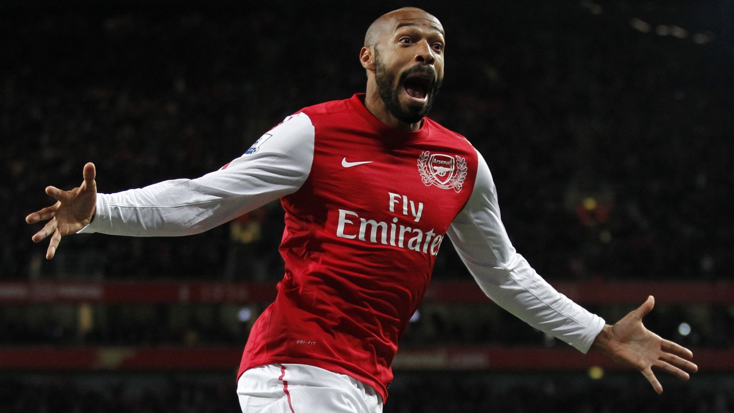 French striker Thierry Henry celebrates after scoring the winner against Leeds on his return to Arsenal.