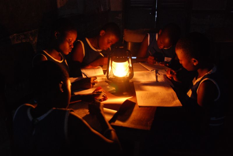 lighting a kerosene lamp