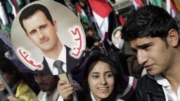 Syrian supporters of President Bashar Assad rally in Damascus on January 9, 2012.