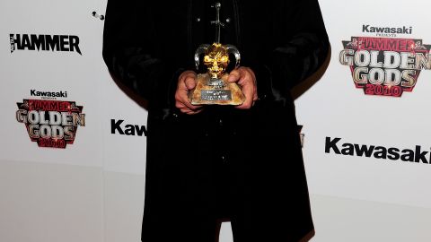 Tony Iommi poses with the best album award at The Metal Hammer Golden Gods Awards in 2010.