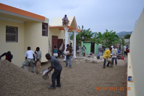 Haitian craftsmen and a team of CAN-DO volunteers rebuild the Bless A Child Orphanage 15 miles outside Port-au-Prince. CAN-DO employed more than 50 local workers for 12 days to complete the revitalization project.