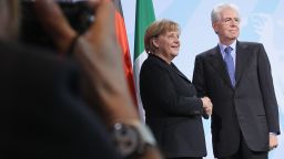 German Chancellor Merkel and Italian Prime Minister Monti after speaking to media at the Chancellery on in Berlin.