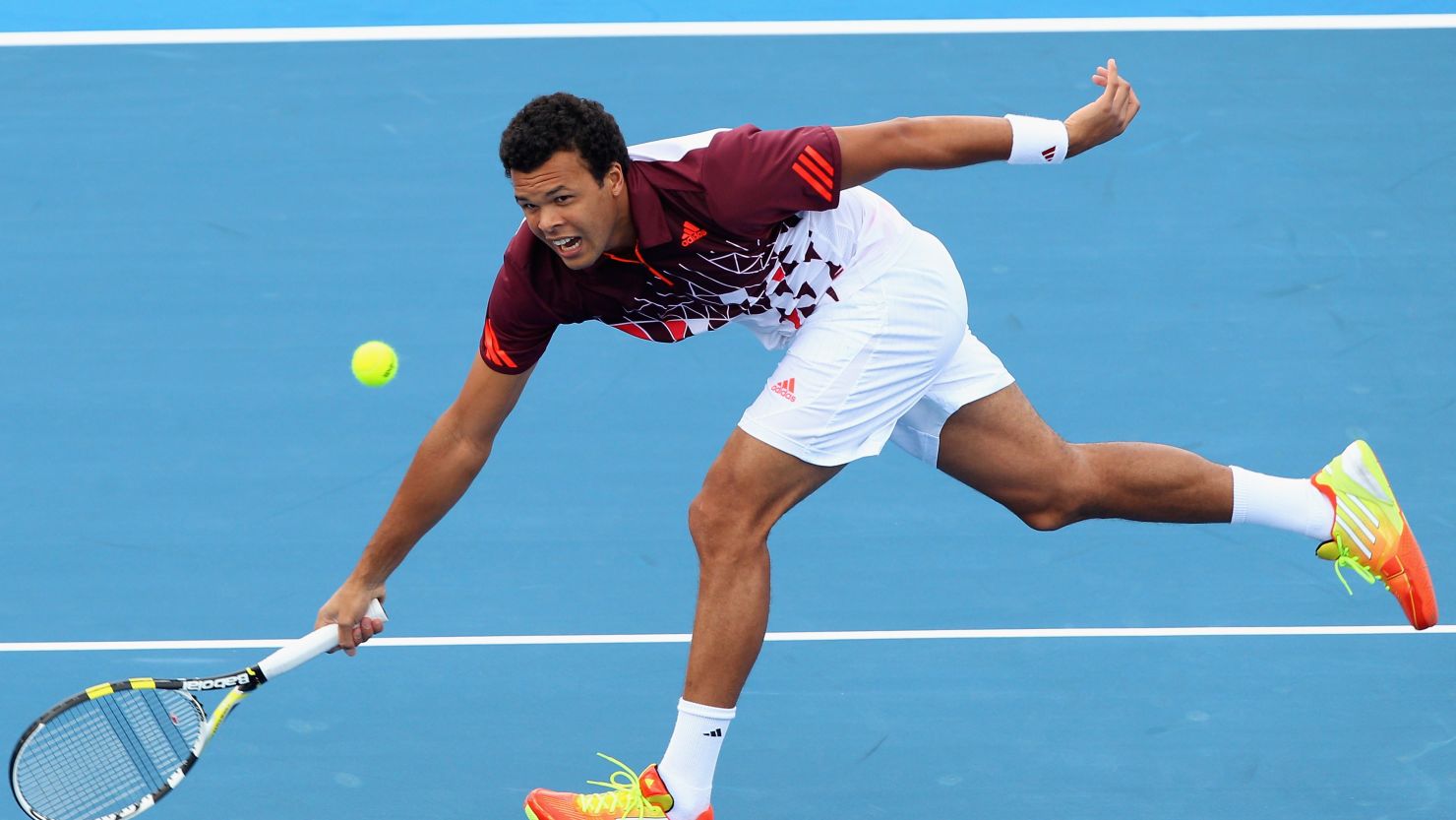 Fatigue and a troublesome wind both contributed to Jo-Wilfried Tsonga's defeat  at the Kooyong Classic.