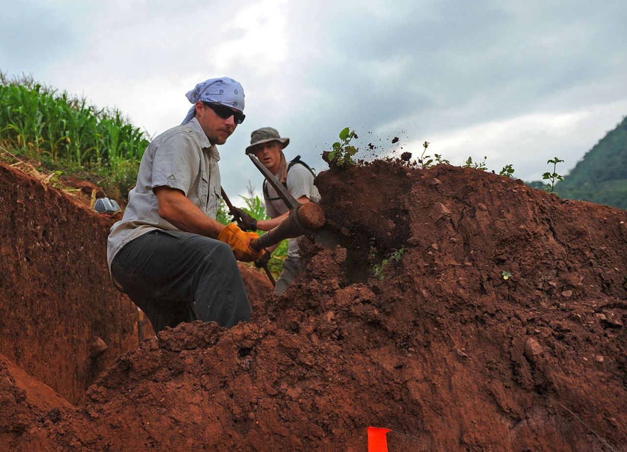 Dr. Josh Peck, forensic anthropologist, takes down the wall of a grid at a recovery site in Vietnam. Five recovery teams are searching in Thai Nguyen, Bac Giang, Lang Son, Son La, and Thanh Hoa provinces at aircraft crash and burial sites for six Americans unaccounted-for from the Vietnam War.