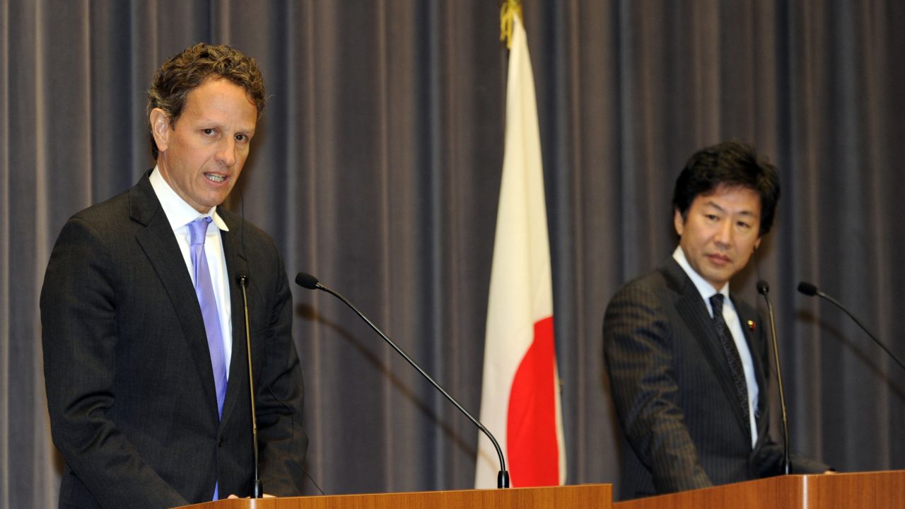 US Treasury Secretary Timothy Geithner, left, at a press conference with his Japanese counterpart Jun Azumilooks at Japan's finance ministry in Tokyo on January 12, 2012.