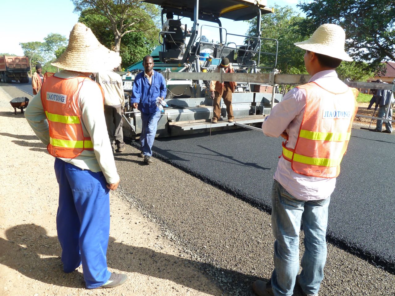 Chinese and Zambian workers building a new road in Zambia.