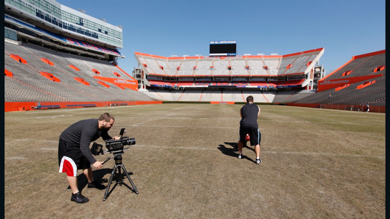 Chase Heavener films Tim Tebow's workout at the University of Florida's Ben Hill Griffin Stadium.