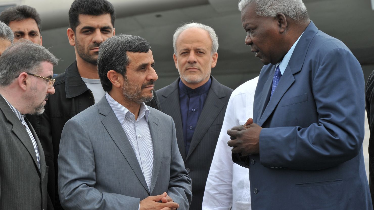 Mahmoud Ahmadinejad is welcomed by Cuban Vice-President Esteban Lazo on his arrival to Havana, on January 11, 2012.
