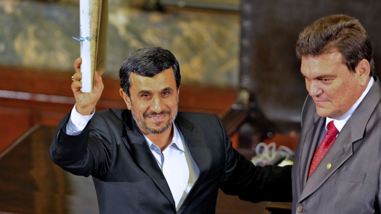 Iranian President Mahmoud Ahmadinejad receives the Doctor Honoris Causa degree from Havana's University on January 11, 2012.