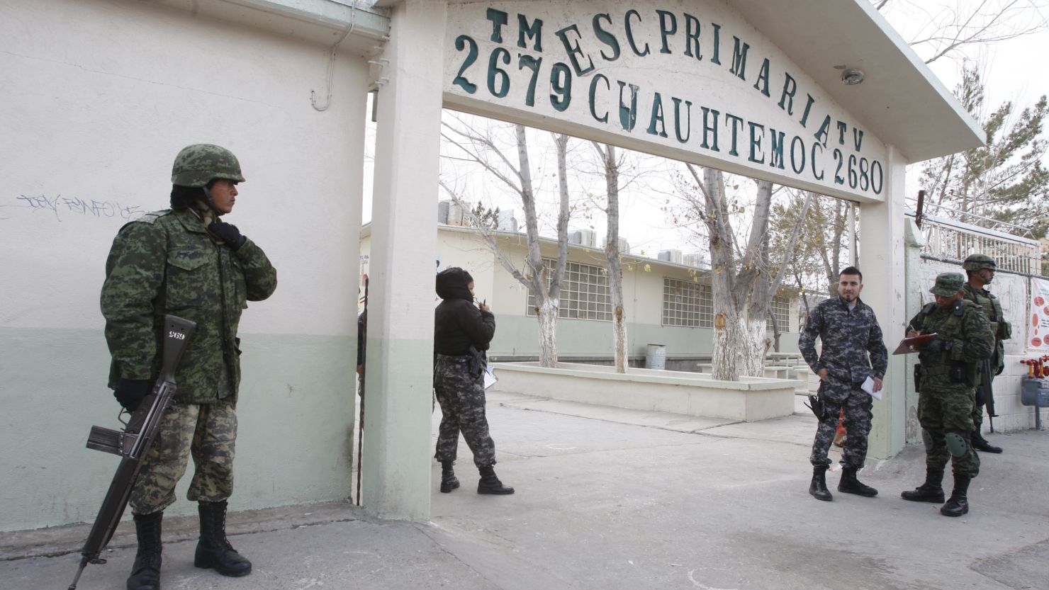 Security forces in Ciudad Juarez, Mexico, respond to a shooting at an elementary school that left one man dead.