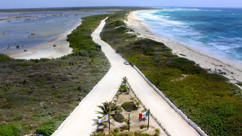 Michael Hilburn captured this view "with the Caribbean on the right and a crocodile infested lagoon to the left" from the top of the lighthouse at Punta Sur Ecological Reserve. 