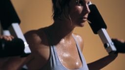 workout too much exercise woman weight lift
