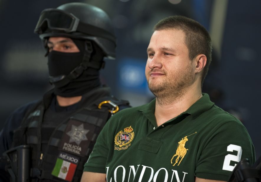 American-born Edgar Valdez Villareal, or 'La Barbie,' of the Beltran Leyva drug cartel, was arrested in August 2010 in Mexico, and smiled as he was paraded in front of the press.