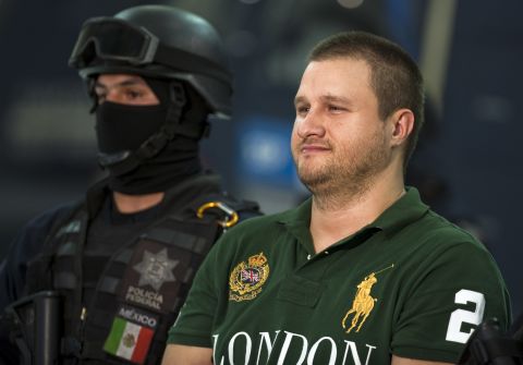 American-born Edgar Valdez Villareal, or 'La Barbie,' of the Beltran Leyva drug cartel, was arrested in August 2010 in Mexico, and smiled as he was paraded in front of the press.