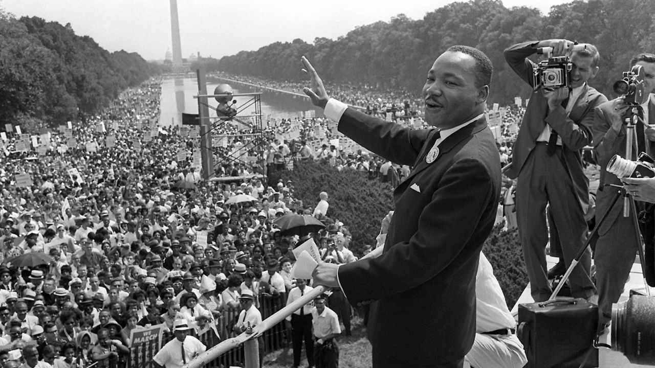 Martin Luther King Jr.'s emphasis on nonviolence and service to his "beloved community" garnered the civil rights leader worldwide recognition. In 1964, at 35 years old, King became the youngest person to win the Nobel Peace Prize.