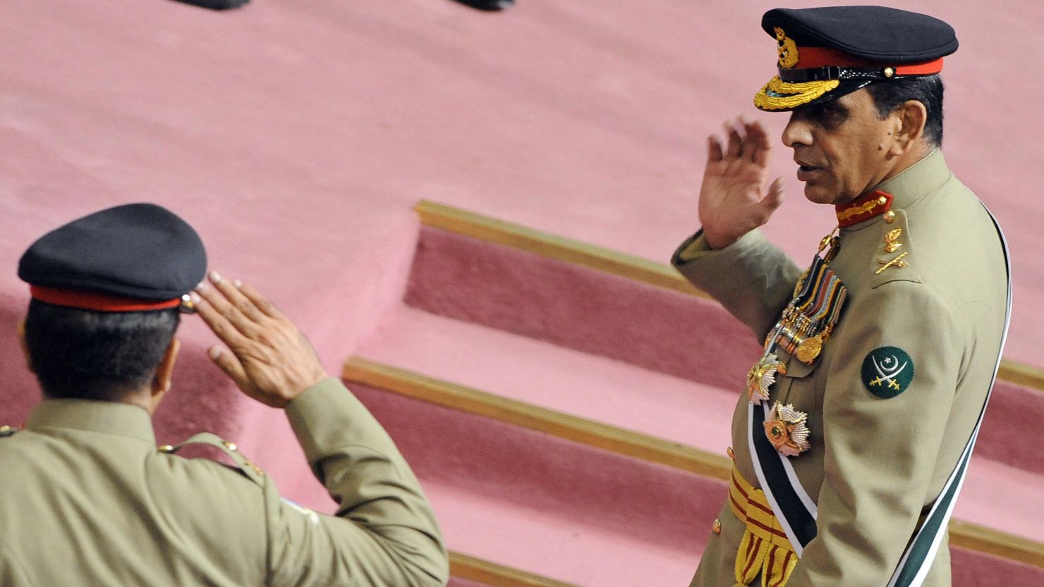 Pakistani army chief General Ashfaq Pervez Kayani receives a salute from an officer in Islamabad in 2008. 