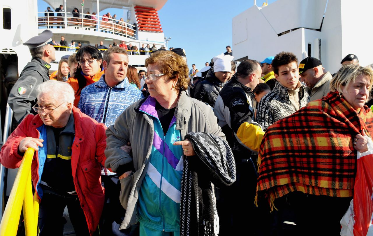 On January 14, crowds prepare to leave the island of Giglio, where passengers were staying after the ship ran aground.