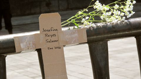 Activists in Mexico City created a cardboard cross marking a victim's death near Ciudad Juarez, Mexico, in January 2010. 