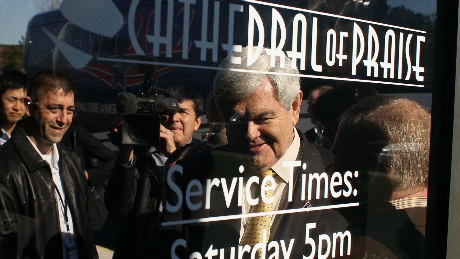 Republican presidential candidate Newt Gingrich arrives to speak during a campaign stop at the Cathedral of Praise Sunday in Charleston, South Carolina.