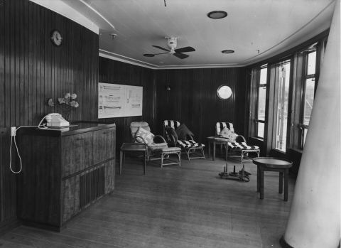 The interior of the veranda lounge on board the Britannia, pictured here in 1954. 