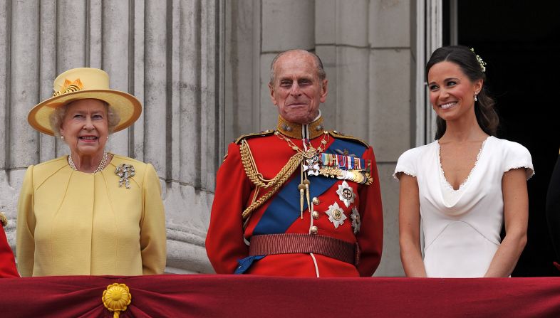 Queen Elizabeth II and Prince Philip on the balcony at Buckingham Palace after the Royal Wedding of Prince William to Catherine Middleton on April 29, 2011 in London, England. 