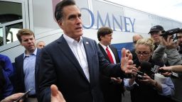 Republican presidential hopeful Mitt Romney talks to journalists after a campaign rally in Florence, South Carolina, on Tuesday.