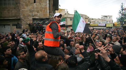 An Arab league monitor is  carried though the crowd in Zabadani, Syria on January 15, 2012.
