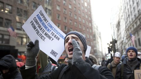Occupy demonstrators rally on Martin Luther King Day outside the Federal Reserve in New York.