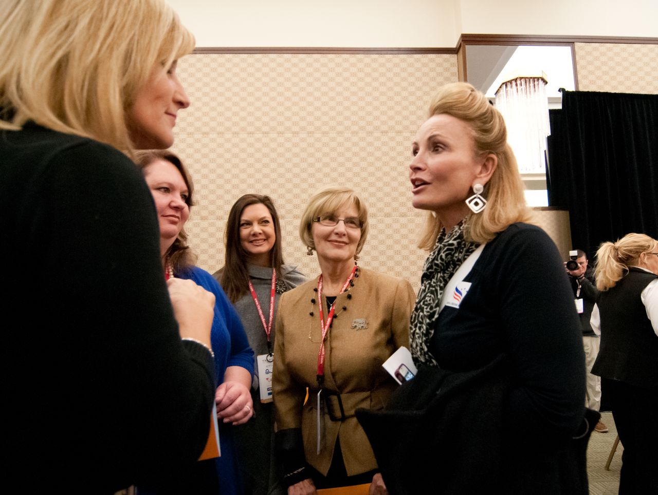 Costa, right, chats after the Myrtle Beach prayer breakfast in January. For 15 years, Costa has served on the 150-member Republican National Committee, the party's governing body.