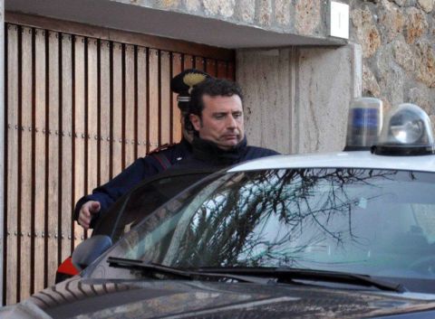 Italian police escort the captain of the Costa Concordia cruise liner, Francesco Schettino, on January 14. Prosecutors accused the captain of piloting the ship too fast to allow him to react to dangers, causing the shipwreck, according to legal papers.