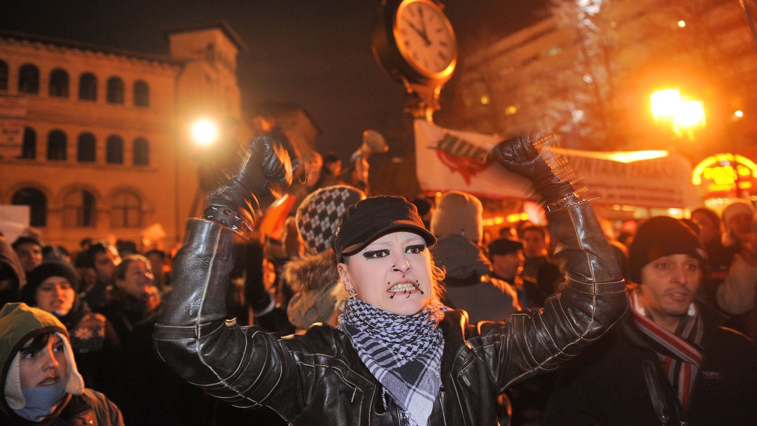 A protester gestures during an anti-presidential rally in Bucharest on January 17, 2012.