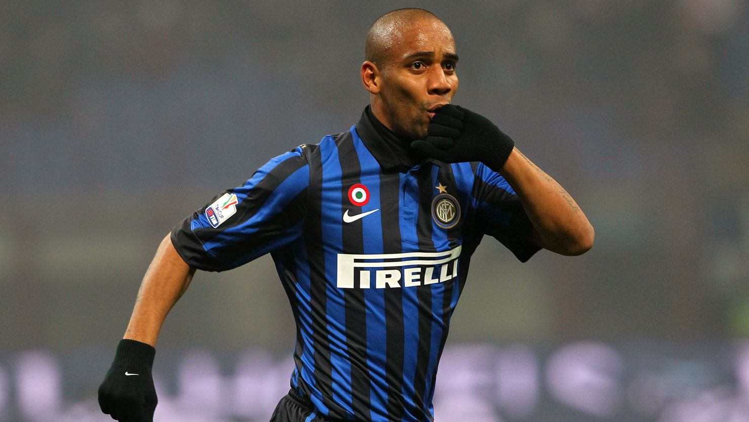 Maicon celebrates scoring Inter's opening goal in their 2-1 Italian Cup win over Genoa.